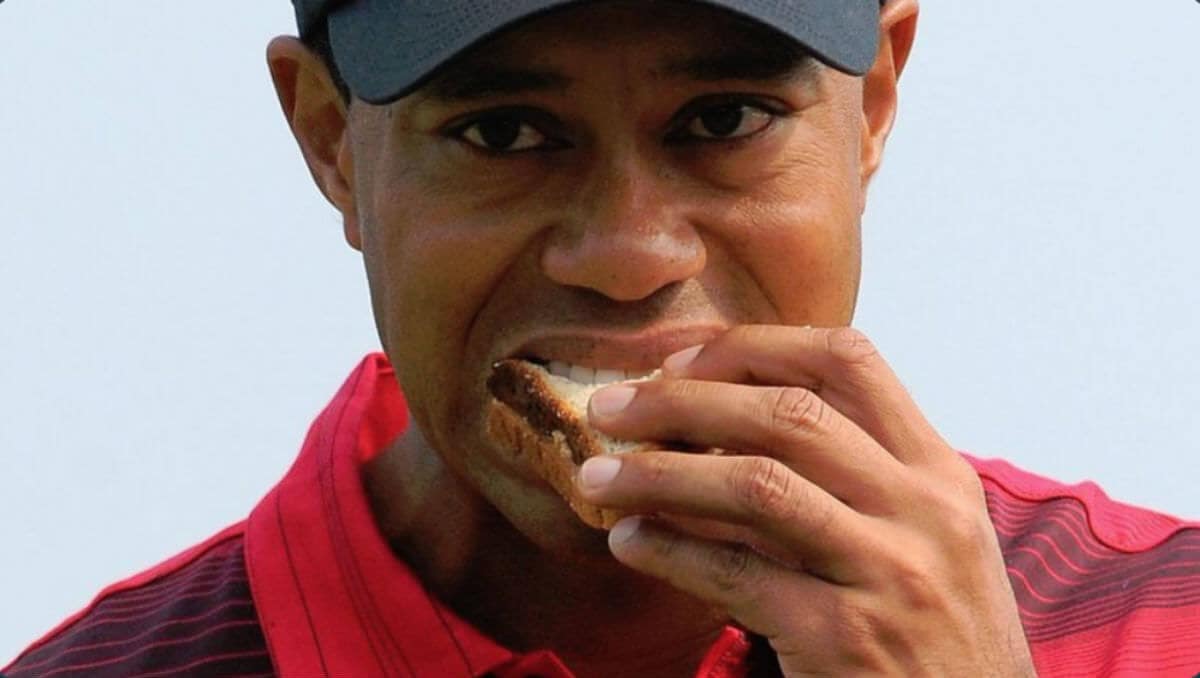 Tiger Woods Eating A Sandwich